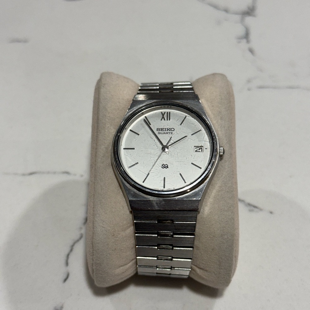 Vintage 1983 Seiko quartz 8122-7020 silver snowflake dial